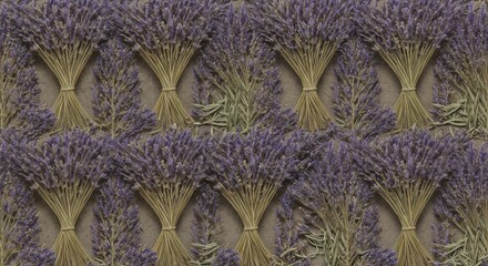 Obraz premium Aromatic lavender bunches arranged in a repetitive pattern on rustic background