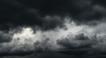 Fototapeta premium Dramatic dark storm clouds gathering in the sky
