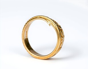 Elegant Golden Ring with Detailed Engravings on White Background