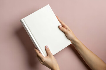 Obraz premium Elegant White Wedding Photo Album Mockup with Delicate Texture on Soft Pink Background