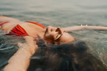 Happy woman sea relaxing floating in transparent sea water on summer holiday. Travel leisure recreation lifestyle, female in nature.