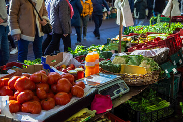 Farm products sold directly by the farmer at a market. Outdoor market in the street
