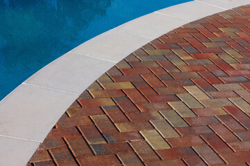 red brick floor and edge of pool