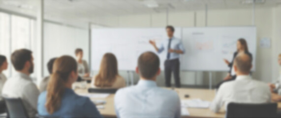 Blurred background of a diverse group of employees engaged in a lively presentation led by a business professional, wide