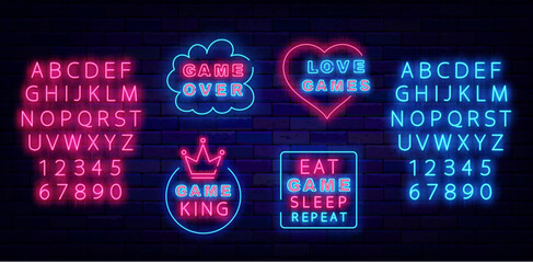 Naklejka premium Game neon emblems collection. VR games. Eat, sleep, game and repeat. Vector stock illustration