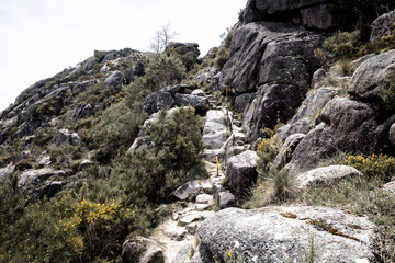 a rocky mountain path on the way up to the castle of Castro Laboreiro, municipality of Melga&ccedil;o, district of Viana do Castelo, Portugal