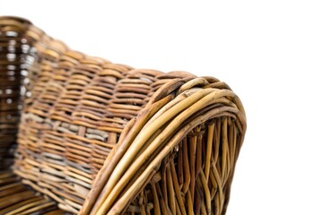 A close-up view of a wicker bench with intricate details and texture on a pure white background