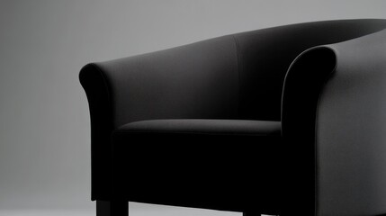 A single black chair sits on a plain white floor, perfect for minimalist interior design or art installations