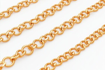 Obraz premium A close-up of a gold chain lying on a white surface, ideal for jewelry or fashion related compositions