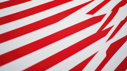 Fototapeta premium Close up of a red and white striped wall, suitable for use in interior design or architectural photography