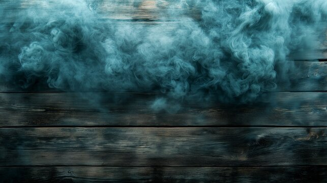 Mysterious blue smoke rising against rustic wooden background