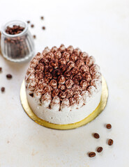 Traditional italian desert tiramisu in a jar.