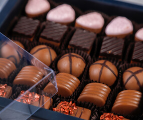 Handmade chocolate with pistachios, dark and milk chocolate pieces.
