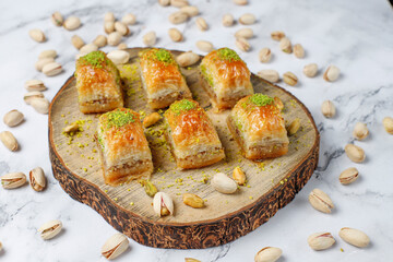 Turkish-style pistachio baklava with a glass of milk.