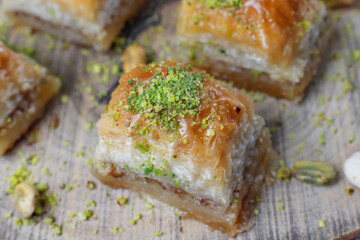 Turkish-style pistachio baklava with a glass of milk.