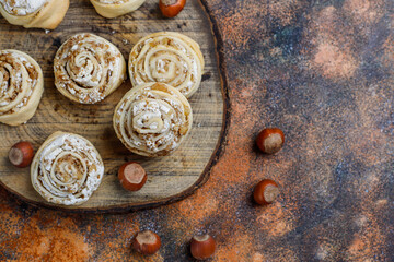 Delicious homemade meringue roll round cookies with nuts.