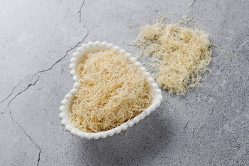 Homemade uncooked kataifi or kadaifi dough.