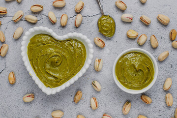 Delicious homemade pistachio paste or cream,spread with pistachios.