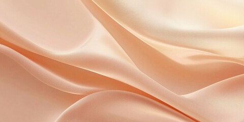 Fototapeta premium A warm peach silk fabric background with delicate folds and a soft glow