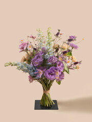 Purple and Pastel Spring Bouquet with Roses and Delphinium