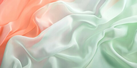 Obraz premium A luxurious abstract Peach and Mint Soft Silk Fabric Background