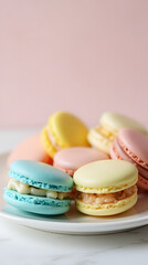 Obraz premium Bright pastel macarons on a white plate - close-up for a banner dedicated to gourmet desserts, pastries, food photography and sweet treats.