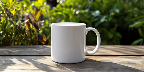 An empty white coffee mug sits on a wooden table with green plants in the background, showcasing its clean and simple design. The mug has no text or graphics for mockup purposes, mockup