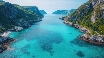 Fototapeta premium Aerial view of turquoise fjord with mountains.