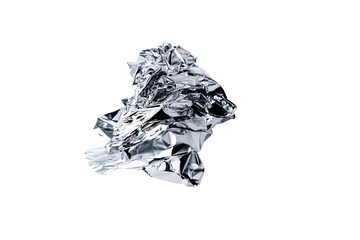 Crumpled silver foil pieces scattered on a transparent background. The metallic texture reflects...