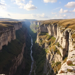 Cliffs of Cheddar Gorge from high viewpoint. High limestone cliffs in canyon in Mendip Hills in...