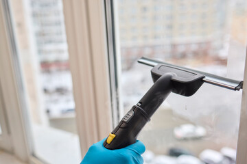 Winter Window Cleaning performed with a Squeegee for optimal results and clarity
