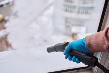 Efficient Steam Cleaning of Windows Utilizing Specialized Professional Equipment and Tools