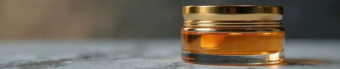 Luxurious golden lid atop a sleek glass container, elegance, container, bottle