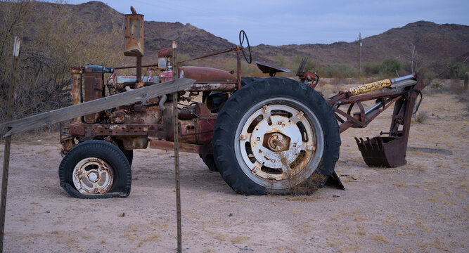 Decaying Tractor Yard Art on Display