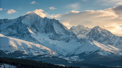 Obraz premium Sunset over Snowy Mountain Range Wide Landscape Photography, Winter, High Peaks Snowscape, Mountain Photography