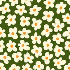 Seamless vector pattern with daisies on the grass. Floral ornament