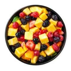 A refreshing mixed fruit salad with mango, pineapple, and berries