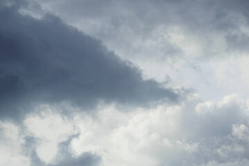 close up of moody clouds turn grey before rain