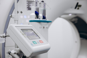 Close-up of a contrast agent before diagnostics in a CT room. The concept of using innovative technologies for accurate vascular examinations and disease diagnostics.