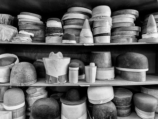 Hat Forms On Shelves In Black And White