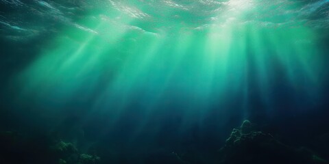 Fototapeta premium Abstract underwater scene with gradient green, blue colors. Sunlight rays penetrate deep into water. Dark bottom with rocks. Minimalist graphic design. Simple abstract composition. Suitable for app
