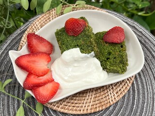 Spinach mixed carrot cake with strawberry and greek yogurt