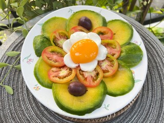 Avocado tomato with yolk and egg white sheet