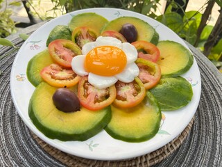 Avocado tomato with yolk and egg white sheet
