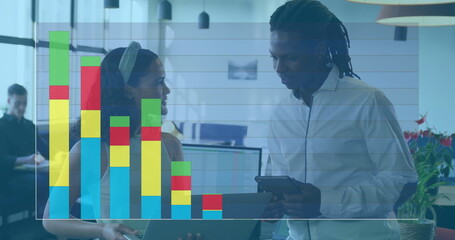 Business data analysis image over colleagues discussing work in modern office