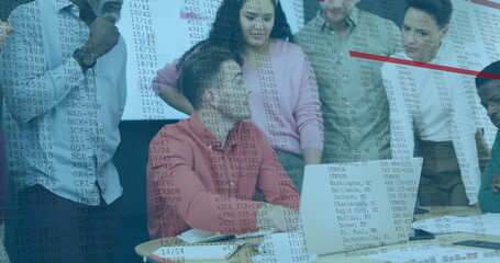 Financial data processing image over diverse business people working on laptops