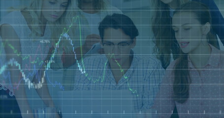 Analyzing financial data image over diverse business team working on laptop