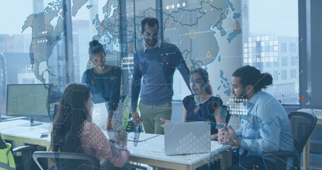 Global data analytics image over diverse business team collaborating in office