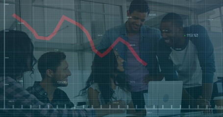 Financial graph image over diverse business team collaborating in office