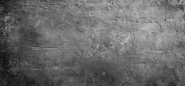 Grunge gray concrete wall texture with dark industrial background creates a rough and aged surface perfect for overlay